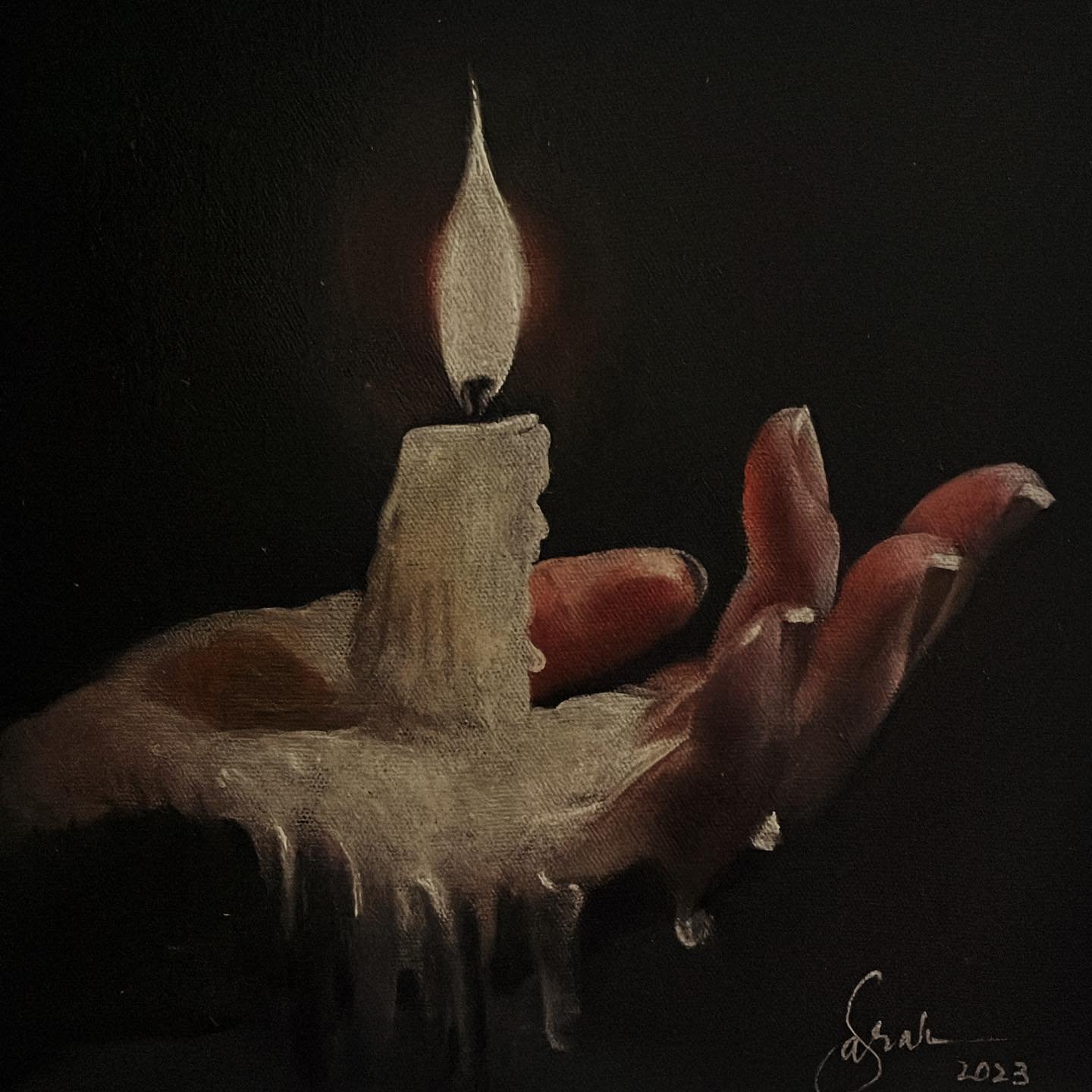 An Cadle Img with on Hand